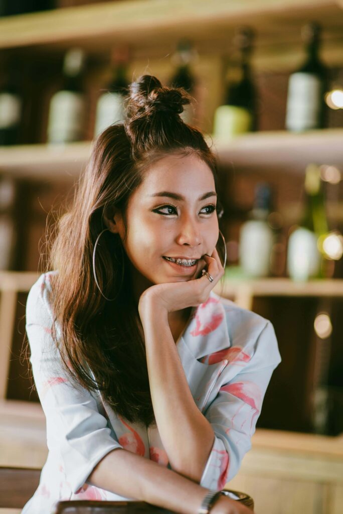 woman smiling with braces